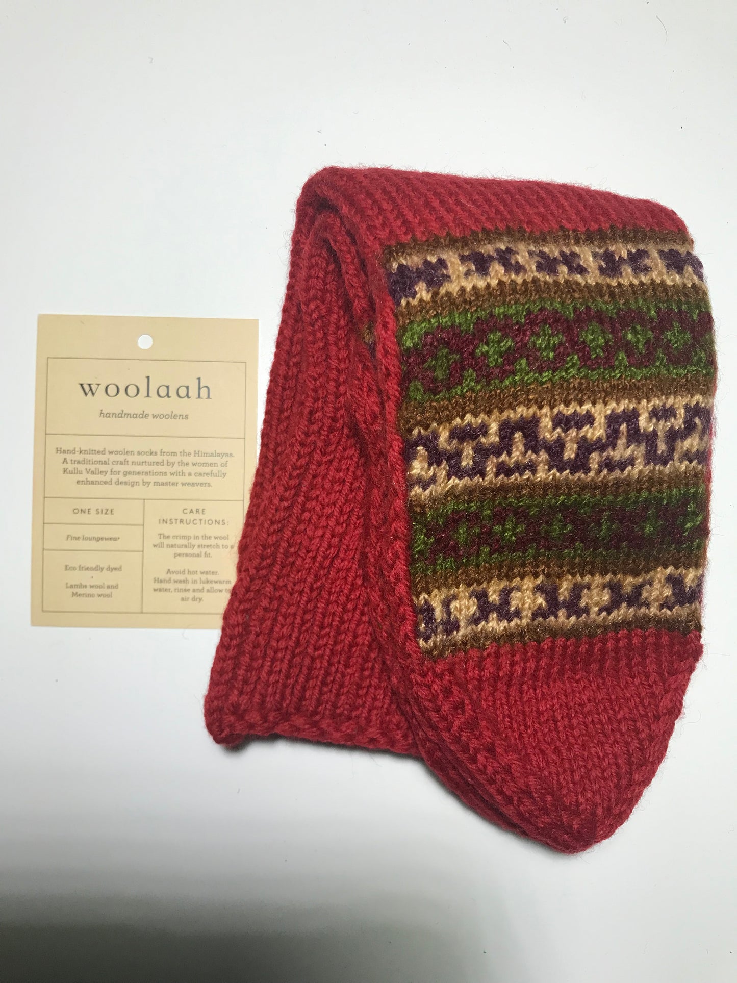 "Valley Red" - hand knit woollen socks with a Red base and subtle Kullu pattern