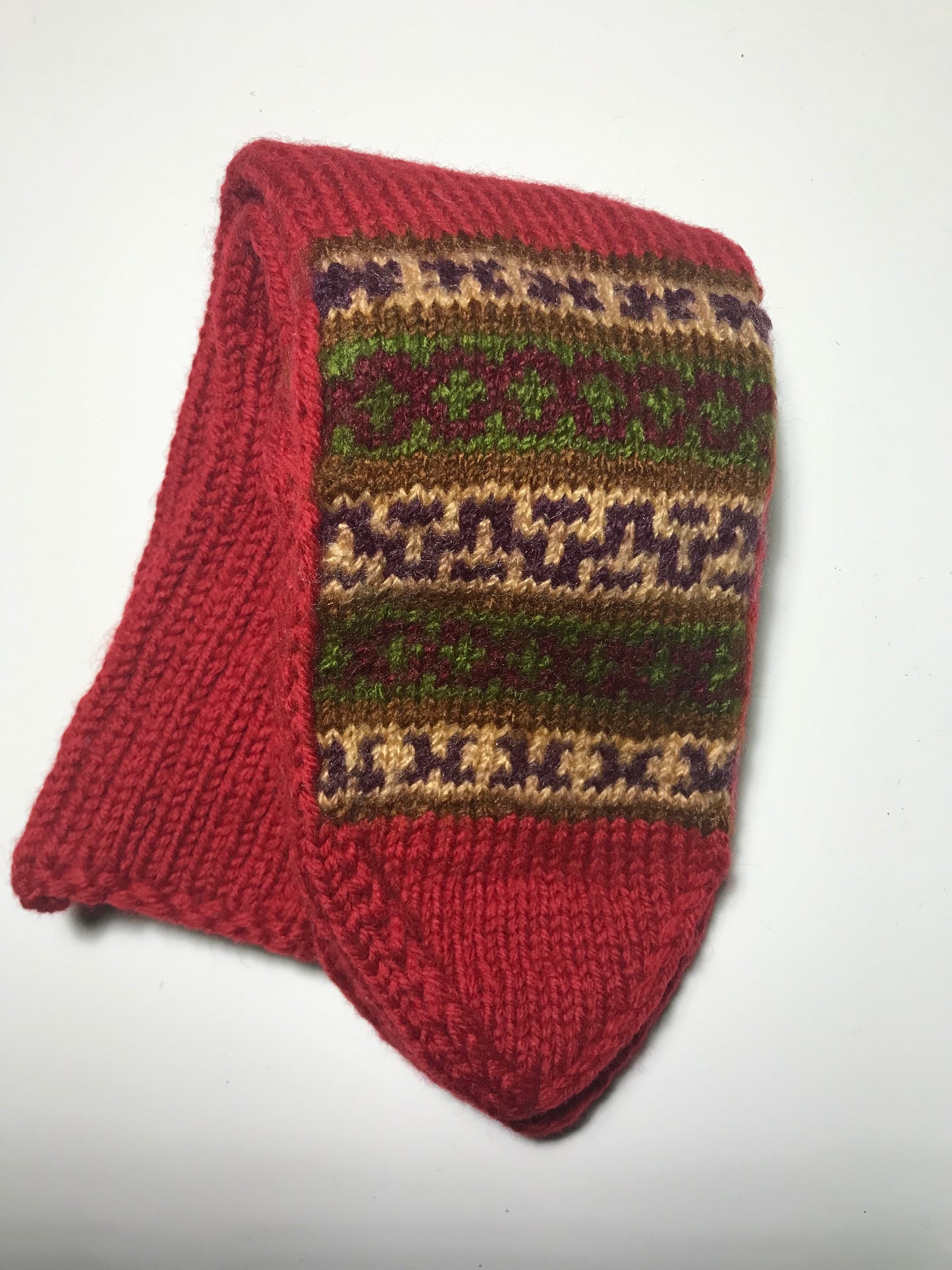 "Valley Red" - hand knit woollen socks with a Red base and subtle Kullu pattern